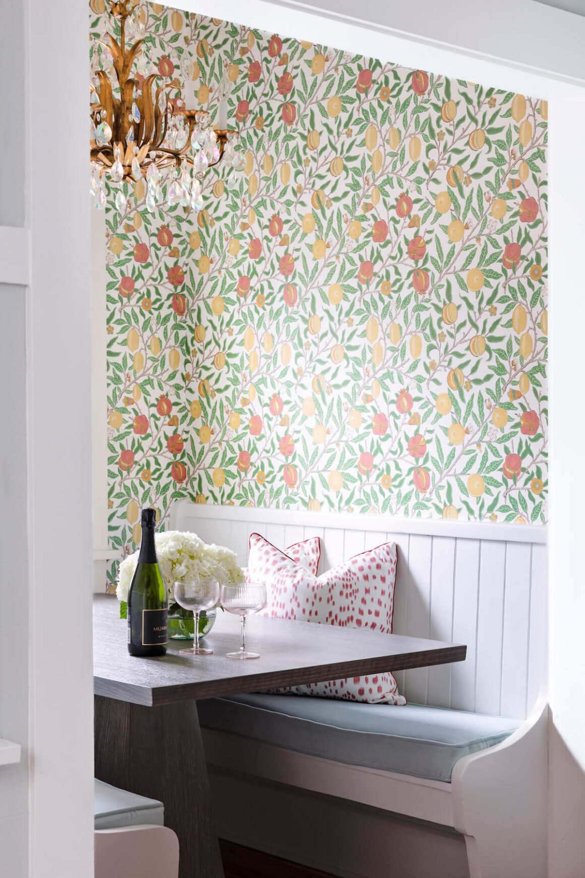 breakfast nook with bright floral wallpaper