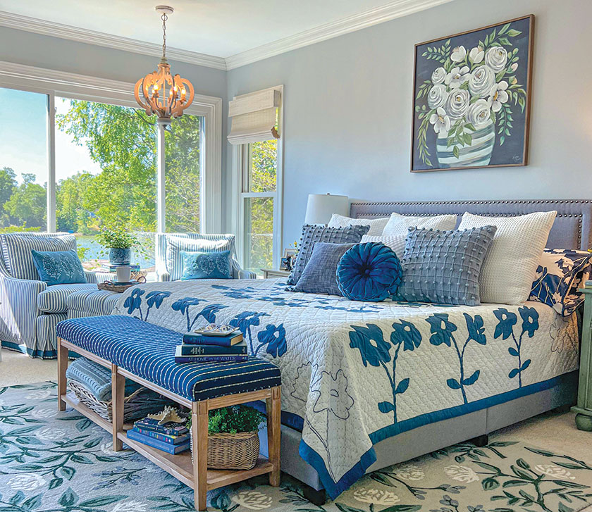 blue bedroom sanctuary in lakeside home