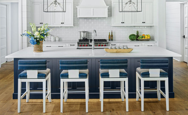 kitchen with large island and white subway tile in Lake Michigan cottage