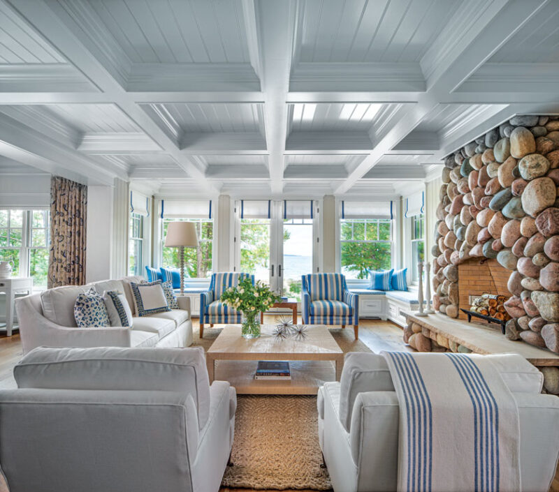 river rock and limestone fireplace and coffered ceiling in Lake Michigan cottage