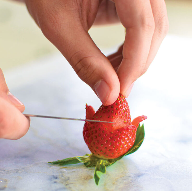 diagonal cuts to make strawberry look like a rose
