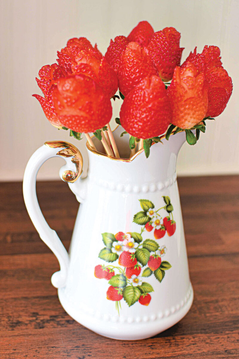 vintage strawberry pitcher with bouquet of strawberry roses