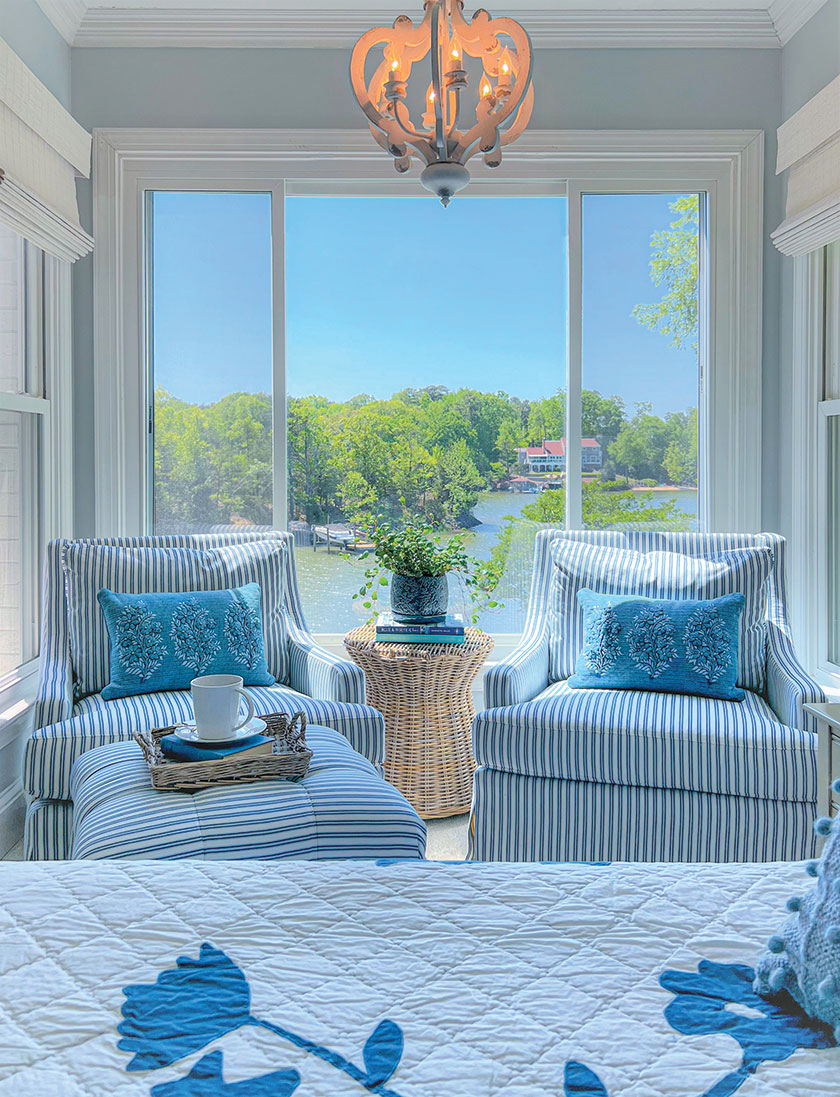 blue and white sitting area with lake view