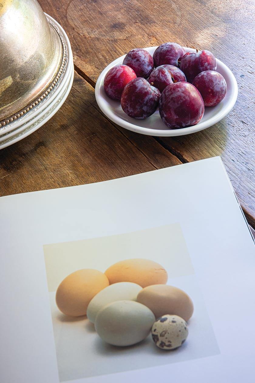 plums on cottage kitchen table