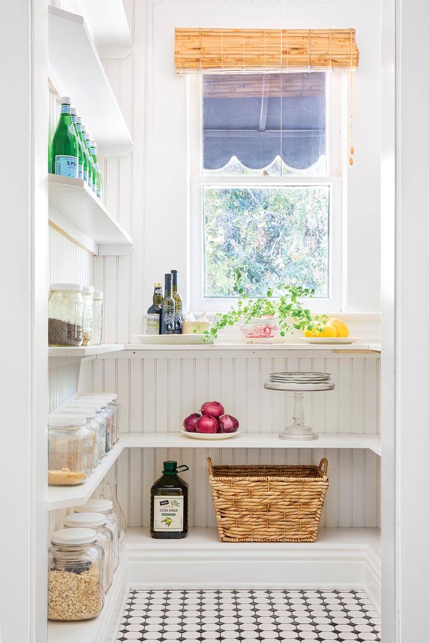 pantry in small cottage with white beadboard