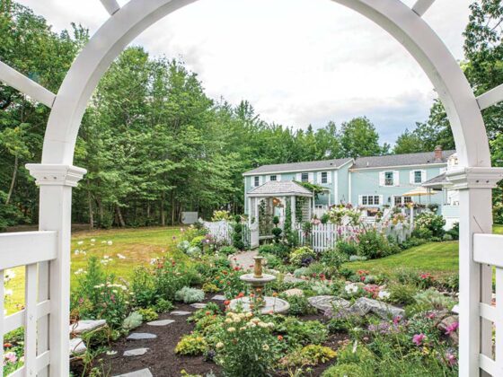 view of walkway and gardens in home gardens in Maine