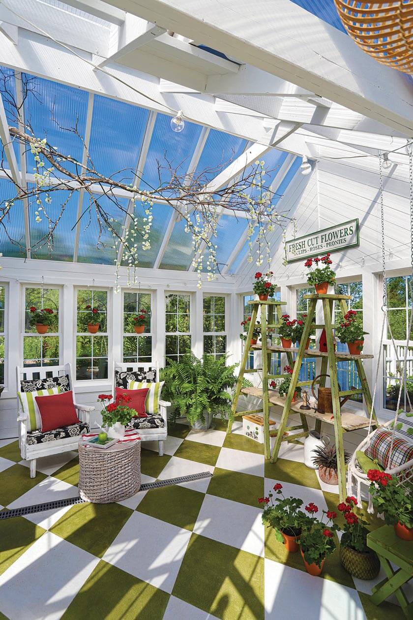 greenhouse with skylights and seating area
