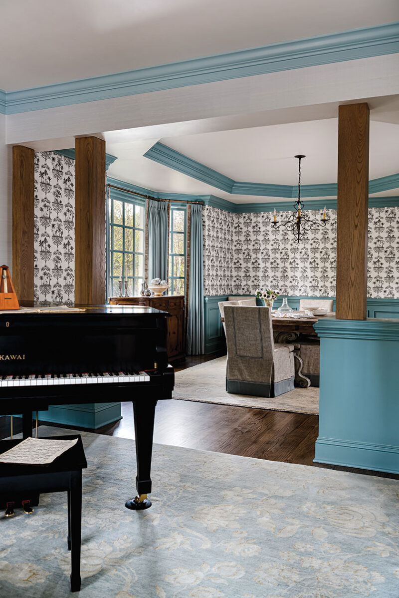 damask wallpaper, blue details in French farmhouse inspired sitting and dining room