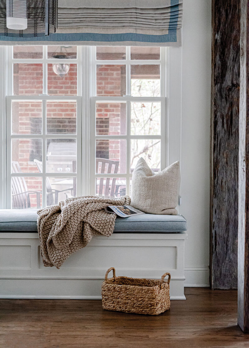 blue and white reading nook in renovated French farmhouse style home