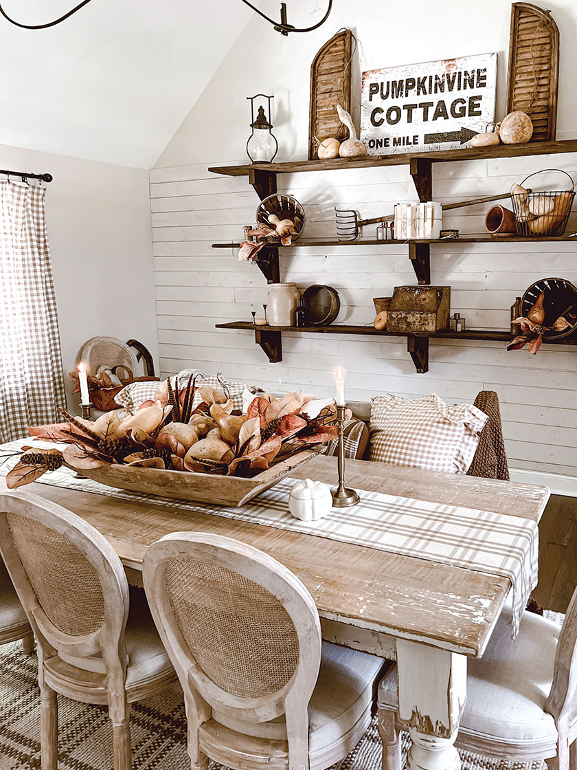 dining area with open shelving and vintage decor in 2024 Brand Ambassador's home