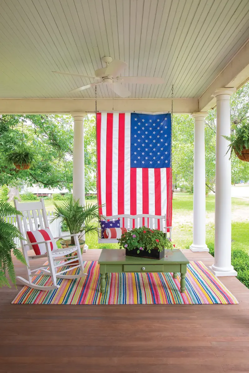 porch with multi-colored striped rug