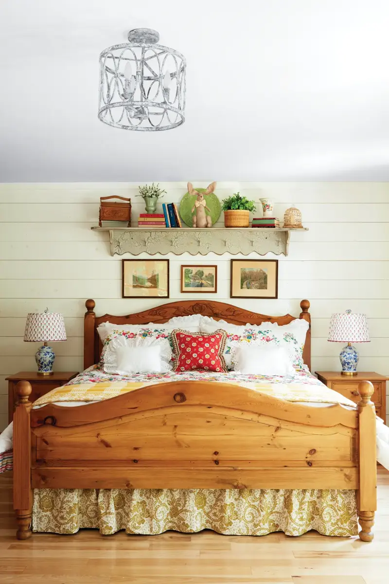 bedroom with scalloped shelf and shiplap wall