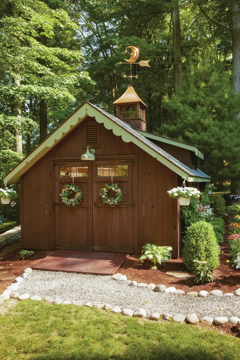 shed with scalloped details and old fashioned weathervane