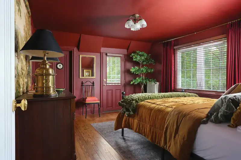 maroon guest bedroom in 1926 Tudor home refresh