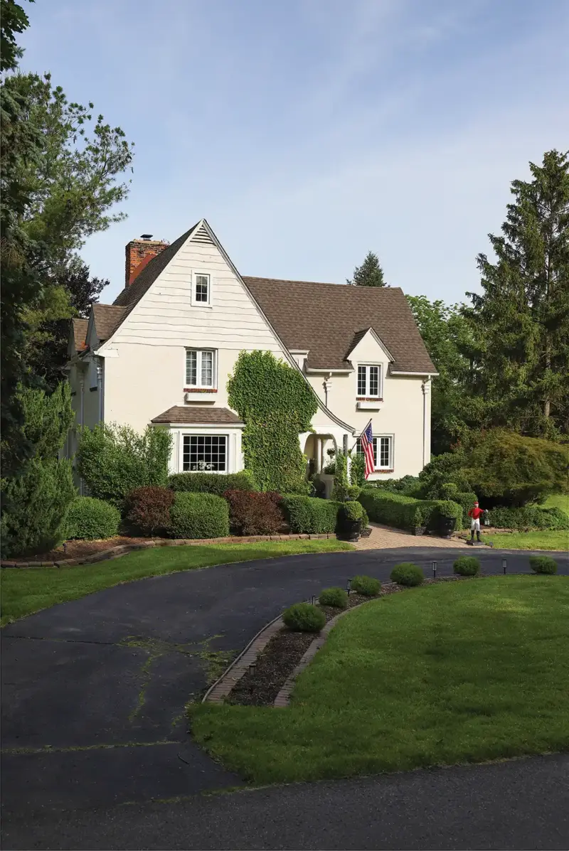 exterior view of 1926 Tudor home refresh in Michigan