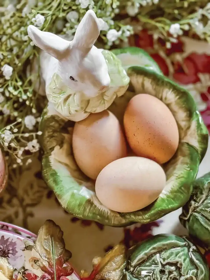 porcelain rabbit with cabbage shaped bowl with hard boiled eggs