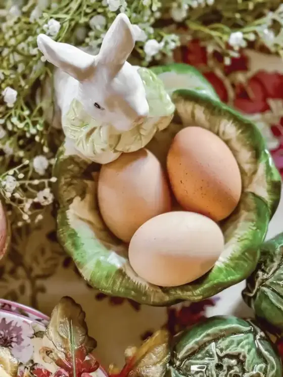 porcelain rabbit with cabbage shaped bowl with hard boiled eggs